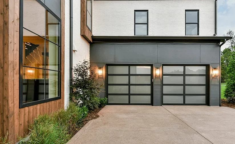 Garage door with glazed window-lite panels across the top section