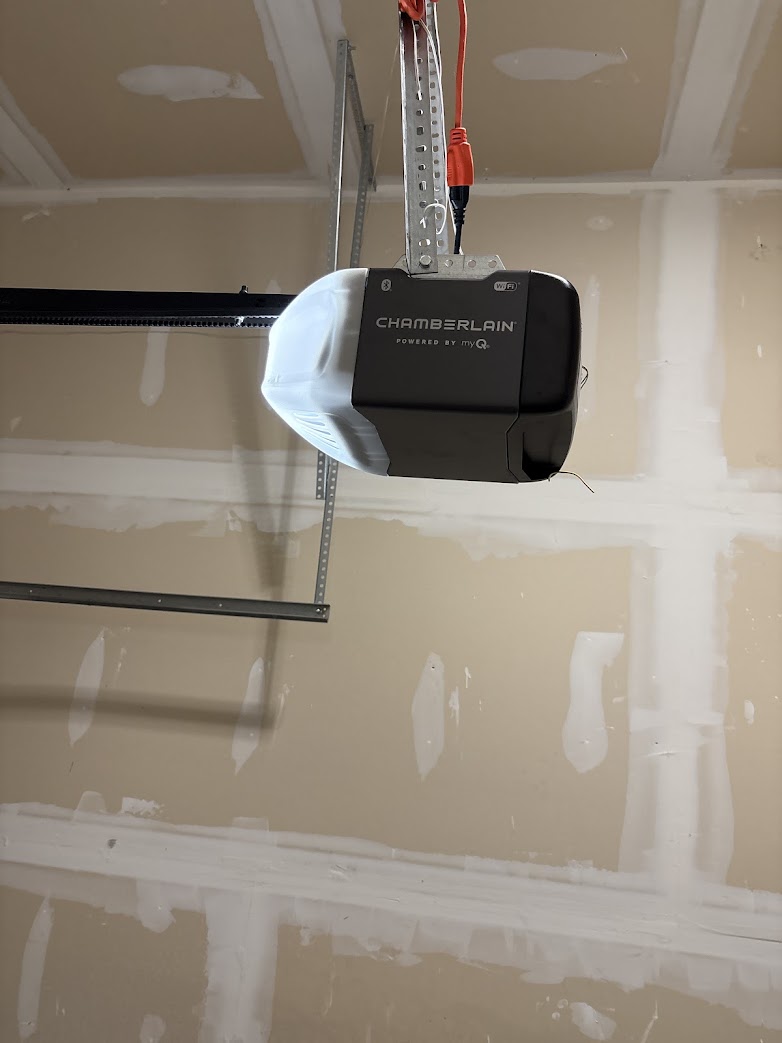 A Chamberlain garage door opener installed in a residential garage